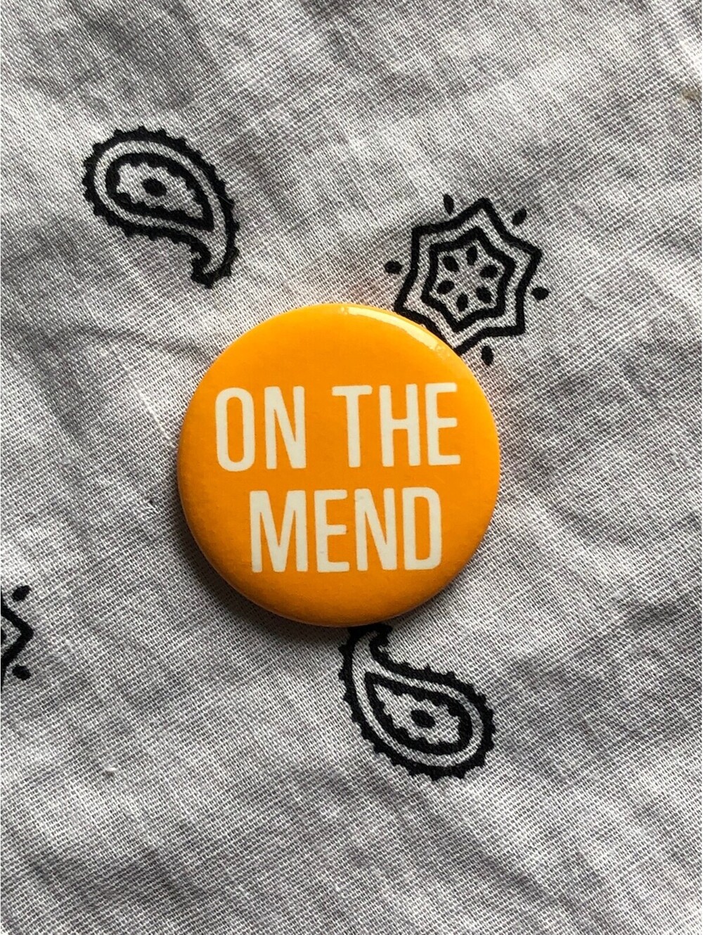 Yellow 'ON THE MEND' Pin Button Badge